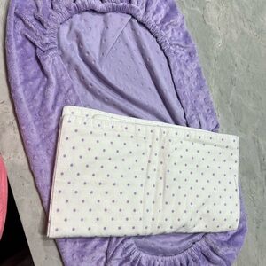 Source Unknown - Purple changing pad cover and White polka dot blanket.